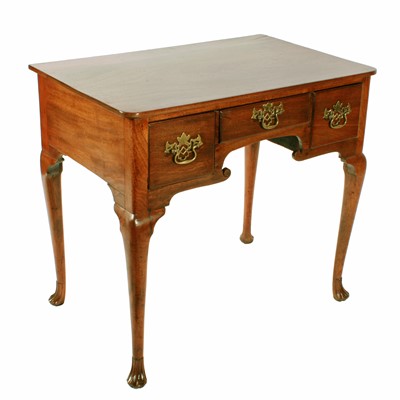 Lot 567 - A George II walnut three drawer lowboy or side table