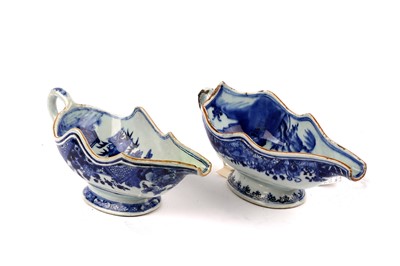 Lot 4 - A mid-18th Century Chinese Qing dynasty blue and white sauce boat; and another