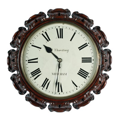 Lot 289 - M Thursting, Mitcham: a Victorian carved walnut wall timepiece