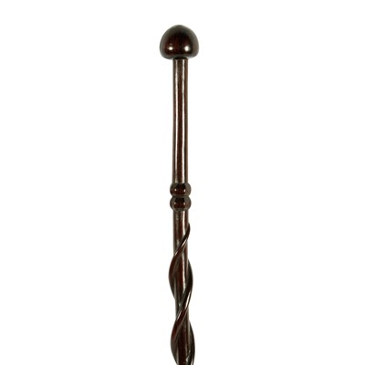 Lot 183 - An early 20th Century carved ebony tribal or ceremonial staff