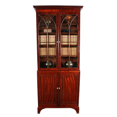 Lot 606 - A George III mahogany cabinet bookcase