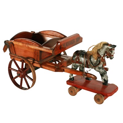 Lot 185 - An early 20th Century carved toy horse and hay cart by F H Ayres Ltd