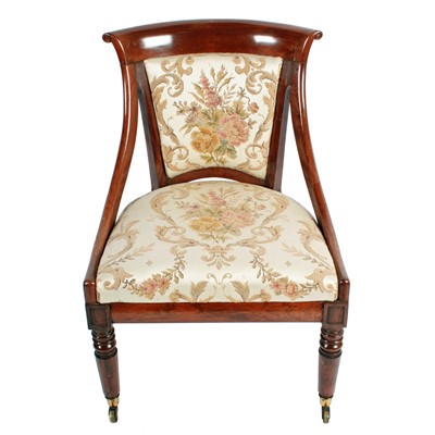 Lot 613 - A George IV rosewood library chair