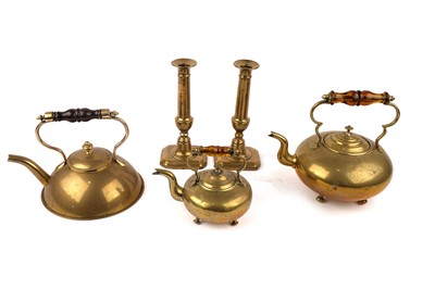 Lot 368 - Three brass kettles; and a pair of Victorian brass candlesticks