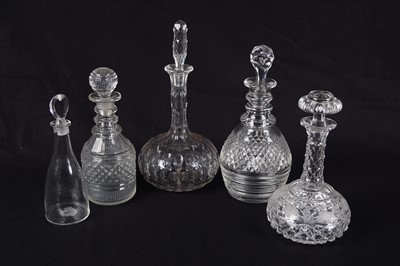 Lot 71 - Five assorted Georgian and later mallet/globe and shaft cut-glass decanters