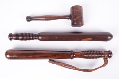 Lot 189 - A Victorian turned oak treen gavel; and two police truncheons