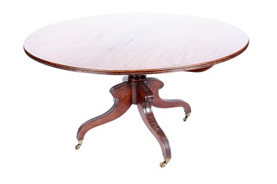 Lot 626 - A Georgian mahogany circular tilt-action breakfast table