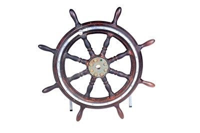 Lot 161 - A mahogany and metal bound ship’s wheel