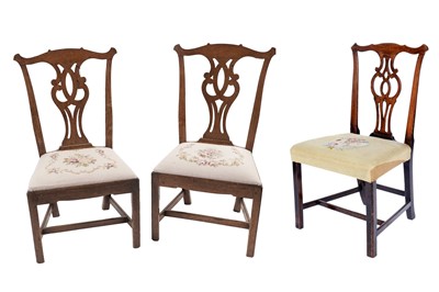 Lot 627 - A pair of Georgian Chippendale design oak dining chairs; and a Chippendale style single chair