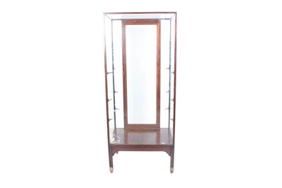 Lot 632 - A mid-20th Century walnut shop display cabinet