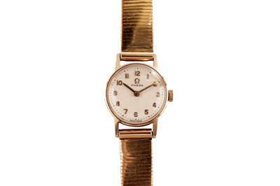 Lot 247 - An Omega gold cocktail wristwatch