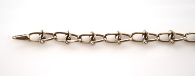 Lot 28 - A bi-colour yellow and white gold fancy link chain bracelet