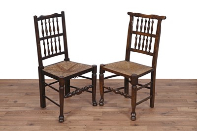 Lot 2 - An Oak drop leaf extending dining table; and a matched set of eight chairs