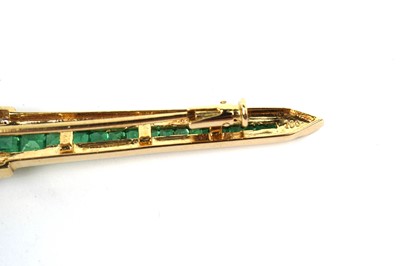 Lot 669 - A bespoke sapphire, emerald, and diamond "dagger" form brooch