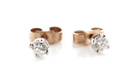 Lot 127 - A pair of diamond stud earrings