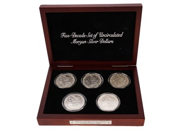 Lot 953 - A five-decade set of uncirculated Morgan silver dollars