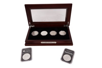 Lot 517 - A cased set of 4 centuries of American silver dollars; and others