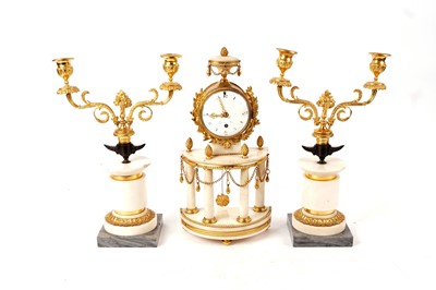 Lot 1376 - A 19th Century French Louis XVI style white marble and gilt clock garniture