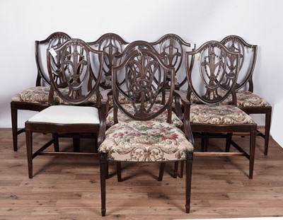 Lot 136 - A matched set of eight Hepplewhite style shield back dining chairs