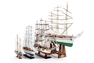 Lot 620 - A collection of four modern wooden model Barques