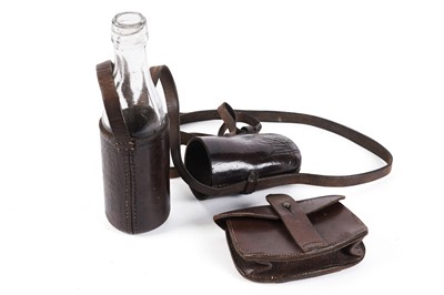 Lot 208 - An ammunition pouch and a bottle