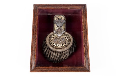 Lot 124 - A Victorian gilt epaulette mounted in glazed oak case