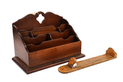 Lot 387 - An early 20th Century mahogany stationary rack; a vintage foot measurer