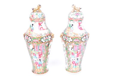 Lot 11 - A pair of Chinese Canton porcelain vases and covers