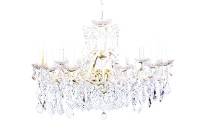 Lot 311 - A modern French style cream painted metal and cut glass twelve-branch chandelier