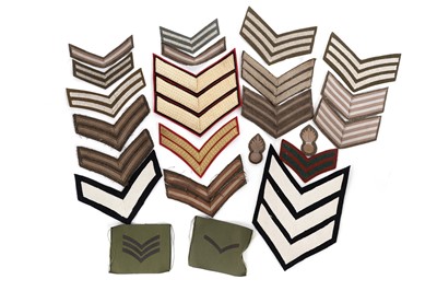 Lot 162 - A selection of military NCOs and other cloth rank stripes.