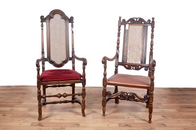 Lot 39 - two Jacobean-style carved oak armchairs, late 19th/ early 20th Century.