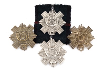 Lot 182 - Four Highland Light Infantry badges