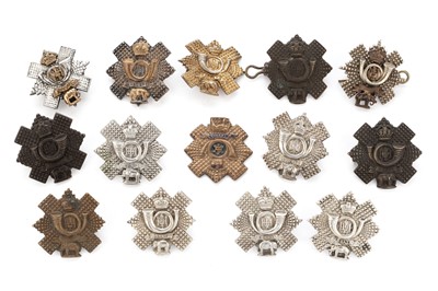 Lot 185 - A selection of Highland Light Infantry collar badges