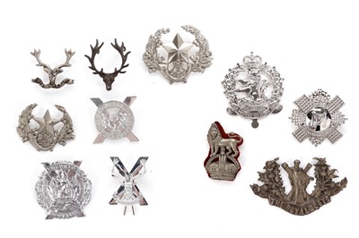 Lot 133 - Highland and other military interest badges