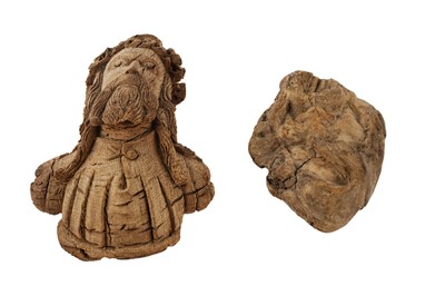 Lot 738 - A carved wooden figure of Christ; another wooden carving of a face