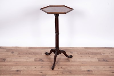 Lot 106 - A 19th Century carved mahogany urn/kettle stand.