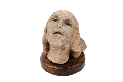 Lot 1408 - A carved stone gargoyle bust