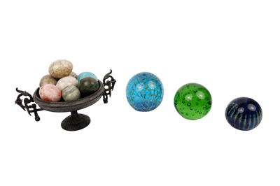 Lot 255 - A collection of specimen stone eggs; and glass paperweights