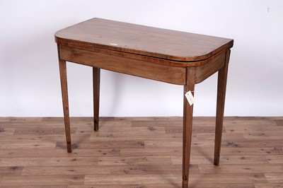 Lot 117 - A George III inlaid mahogany tea table