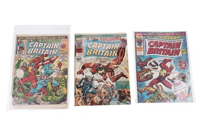 Lot 289 - Three Captain Britain comics including: origin issue with free gift mask