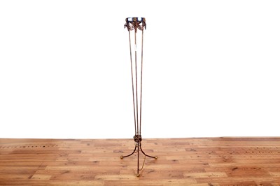 Lot 94 - A decorative wrought metal floor standing lamp