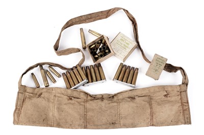 Lot 220 - A British Army Lee Enfield 303 cotton ammunition bandolier; and other items