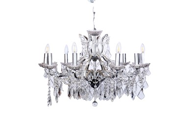 Lot 319 - A twelve-branch silvered metal and cut-glass French style chandelier