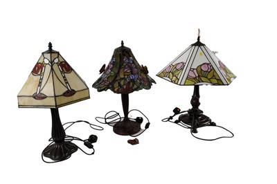 Lot 360 - Three Tiffany style table lamps