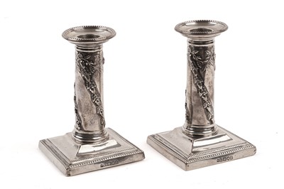 Lot 281 - A pair of late Victorian silver candlesticks