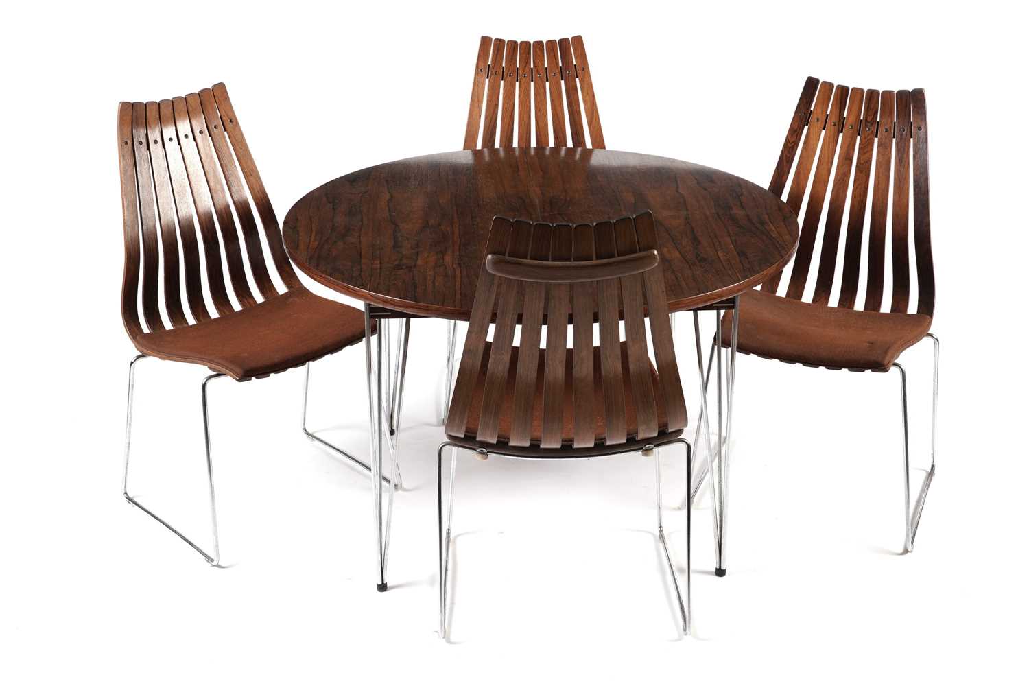 Lot 781 - A Hans Brattrud dining table; and six Hans Brattrud 'Scandia' chairs