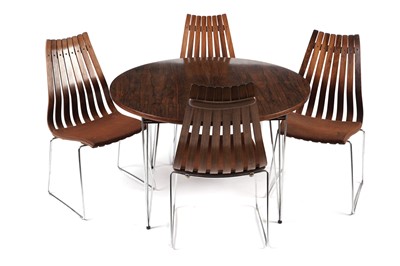 Lot 781 - A Hans Brattrud dining table; and six Hans Brattrud 'Scandia' chairs