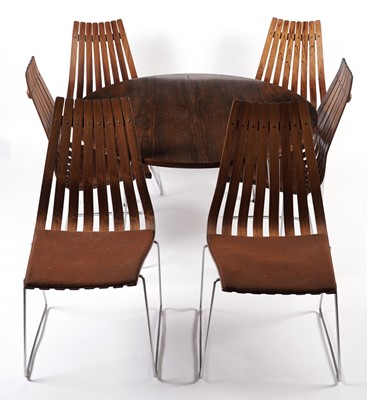 Lot 781 - A Hans Brattrud dining table; and six Hans Brattrud 'Scandia' chairs