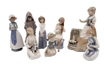 Lot 410 - A collection of Nao decorative ceramic figures