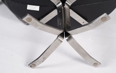 Lot 825 - An EJ5 ‘Corona’ swivel chair and ottoman by Poul Volther